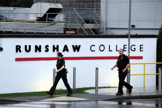 Police outside Runshaw College following the machete attack