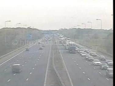 Queueing traffic on the M6 motorway at Thelwall viaduct
