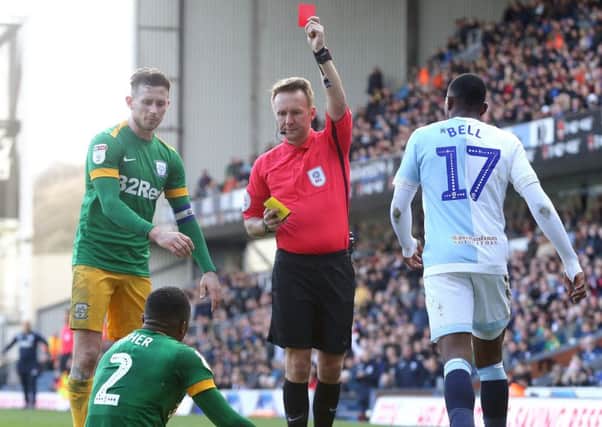 Preston right-back Darnell Fisher is sent off by referee Oliver Langford against Blackburn in March