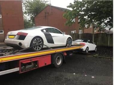 One of the seized cars, an Audi R8