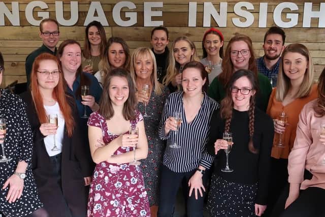 The team from Language Insight celebrates winning the Queen's Award