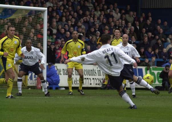 Preston striker David Healy has a shot against Sheffield Wednesday in February 2001