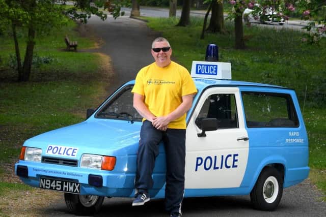 Graham Robinson's charity Reliant Robin 'police car' (Images: JPIMedia)