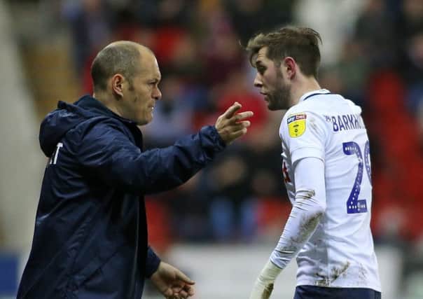Taking instruction from Preston manager Alex Neil