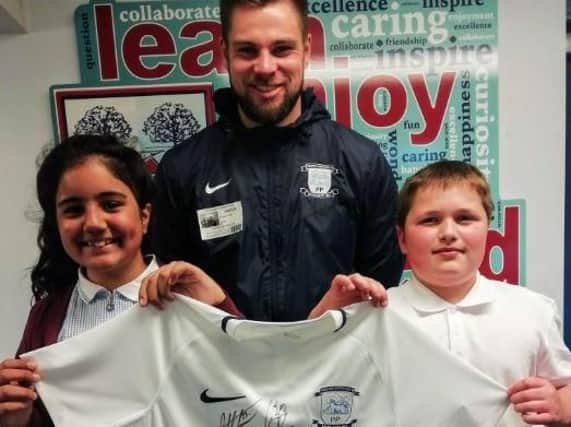 Preston North End have donated a signed shirt to help raise funds for Kennington Primary School in Fulwood.