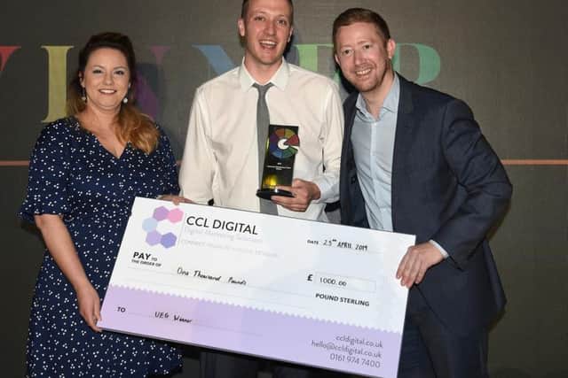 Dave Clayton with his cheque