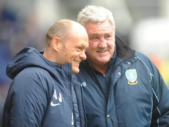 Alex Neil shares a joke with Sheffield Wednesday boss Steve Bruce