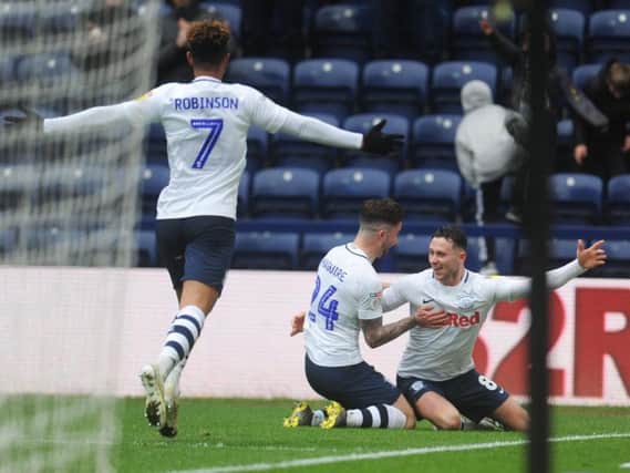 Alan Browne and Sean Maguire celebrate Preston's third goal against Sheffield Wednesday at Deepdale