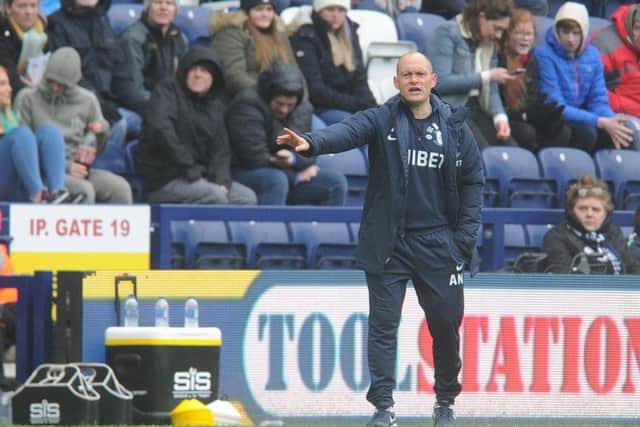 Preston manager Alex Neil delivers instructions from the touchline