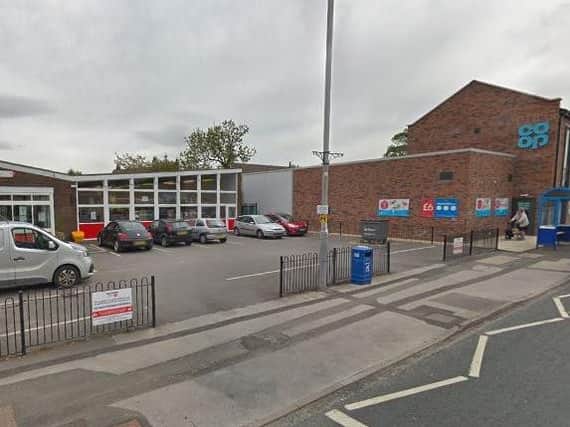 An 18-year-old man has allegedly been robbed at knife-point by two youths in a ginnel between Lostock Hall Library and the Co-op store.