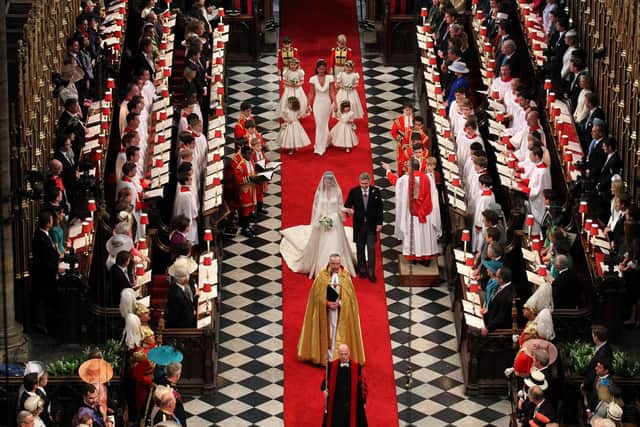 Kate Middleton walks down the aisle accompanied by her father Michael Middleton at Westminster Abbey