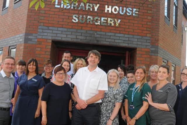 2017: Doctor Clive Barker, centre, retired after 31 years as a GP. Pictured with colleagues at Library House Surgery