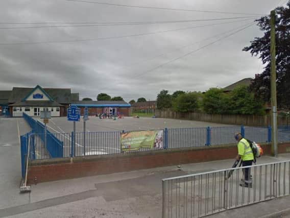 The assault took place outside All Saints Primary School in Moor Road, Chorley on Friday, April 26.