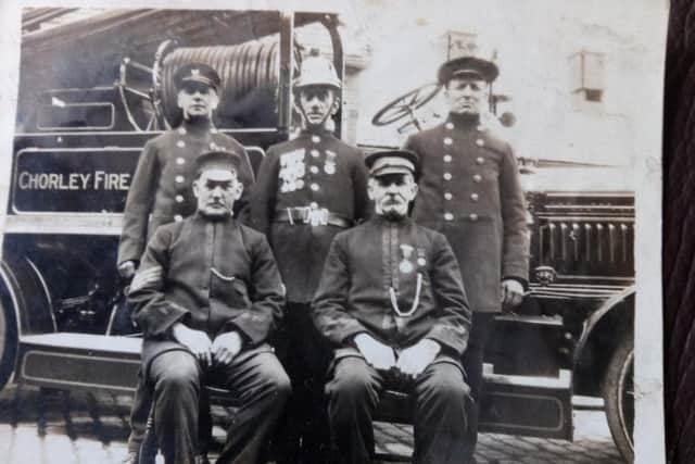 John Smith, back far left, with fellow members of Chorley Fire Brigade in the early 1900s.