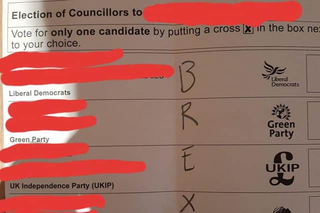 A spoiled local election ballot paper with the word Brexit written on it