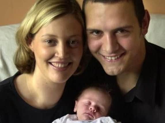 Claire, Danny and baby Ellie Mills
