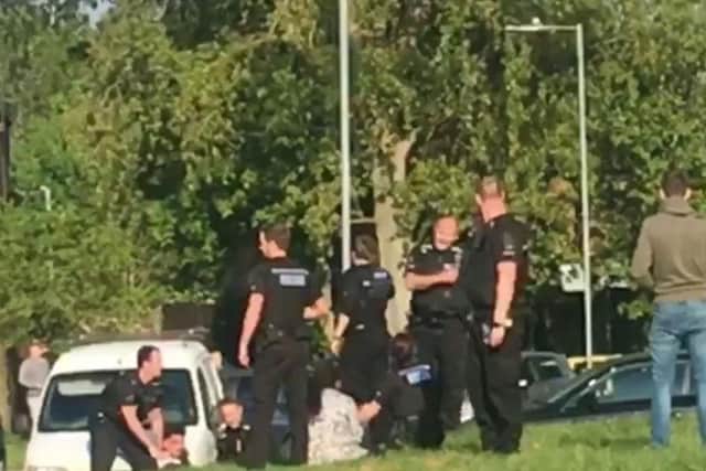 Six people remain in custody in connection with an incident in Essex that saw two police officers hospitalised after having petrol thrown over them.