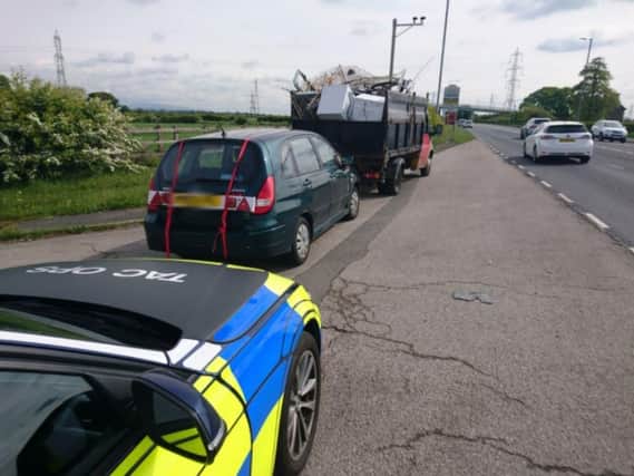 Police stopped the truck and the car it was towing on Blackpool Road in the Lea area of Preston.