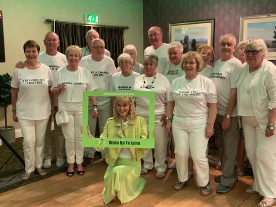 Sophie (centre) and disco goers pictured at the Abba night