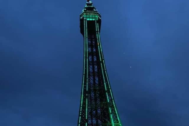 Blackpool Tower lit up in lime green to mark Lyme Disease  Awareness Month