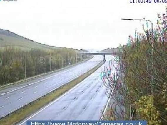 The M62 at junction 23 near Huddersfield at 11am (Photo: Highways England).