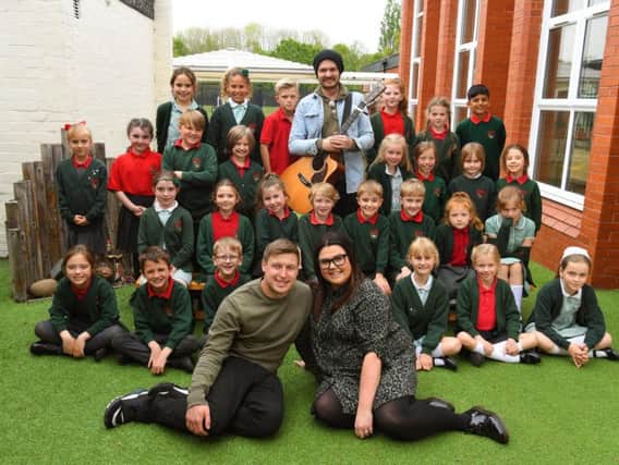 School teacher Kate Levett and her fiance Danny are having 30 children from her school sing at their wedding