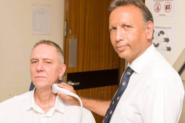 Chris Curtis with Mr Ajay Nigam, Head and Neck Surgeon at Blackpool Victoria Hospital
