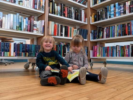Ella and Barnaby in the library at Penwortham Arts centre