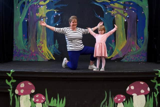 Joan Clayton who used to dance at the community centre over half a century ago with young dancer Lucia, aged three