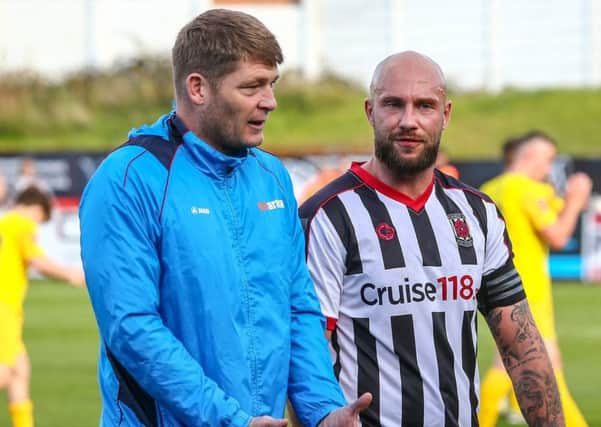 Chorley assistant manager Jonathan Smith with skipper Andy Teague Photos: Stefan Willoughby