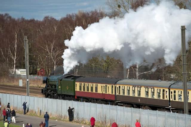 Enthusiasts attempt to get a glimpse of the Flying Scotsman (Pic: OLI SCARFF/AFP/Getty Images)