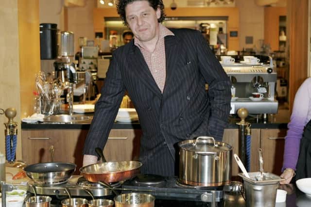 Celebrity chef Marco Pierre White poses during the launch of his cookware
