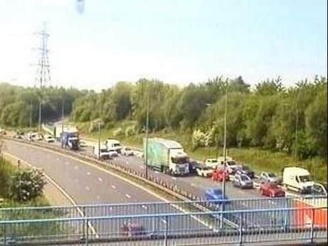 The M61 has been closed in both directions, between junctions 2 and 4, as police deal with an ongoing incident near a bridge.