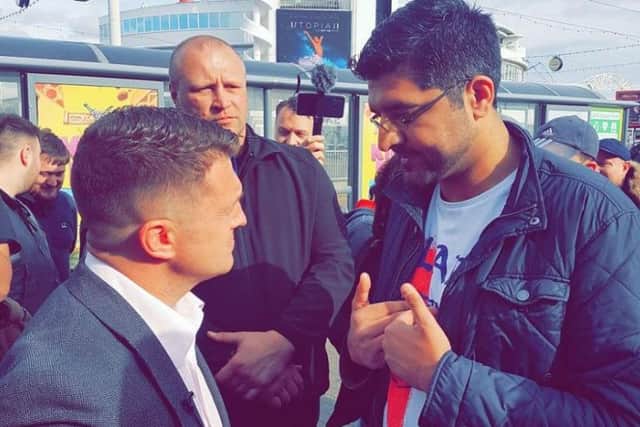 Tommy Robinson and a representative of the Light Foundation.