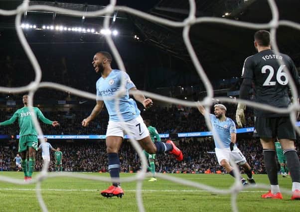 Manchester City's Raheem Sterling celebrates his side's first goal during the Premier League match against Watford in March, a game City won 3-1