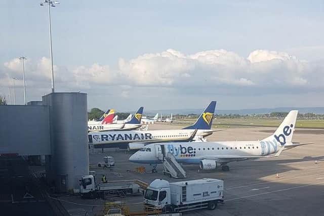 Grounded planes at Manchester Airport this afternoon. Picture courtesy @Bondy_2612