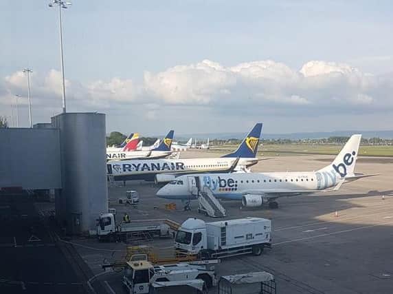 Grounded planes at Manchester Airport this afternoon. Picture courtesy @Bondy_2612