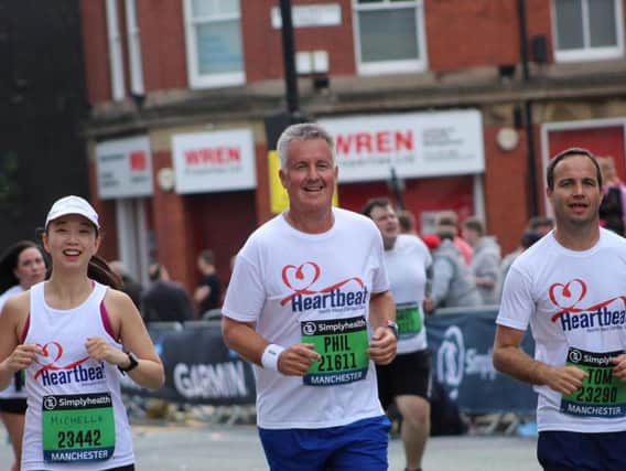 Phil Reece, centre, with Michelle Lee and his son Tom as they ran the Great Manchester 10k for Heartbeat
Photo by Phil's daughter Stephanie