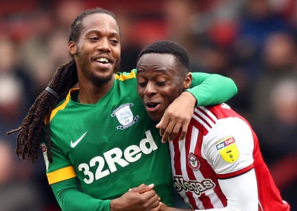 PNE's Daniel Johnson with Brentford's Moses Odubajo in the final game of the season (photo: Getty Images)