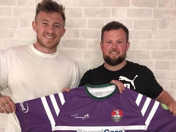 Rugby leagues Josh Charnley with Team Colostomy UK ambassador Kav Ellison