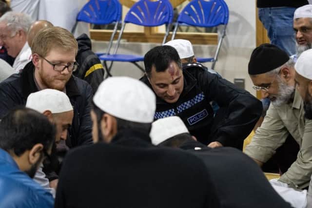 Lancashire Post reporter Tom Earnshaw prepares to break fast with worshippers at the Quwwatul Islam Mosque. Photo: Kelvin Stuttard