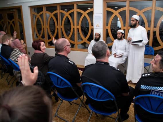 Khalid Ibrahim speaks to guests at the Quwwatul Islam Mosque. Photo: Kelvin Stuttard