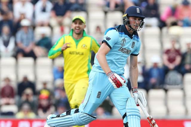 England's Chris Woakes is run out by Australia's Marcus Stoinis