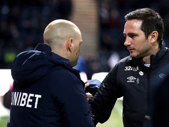 Alex Neil with Derby manager Frank Lampard at Deepdale in February