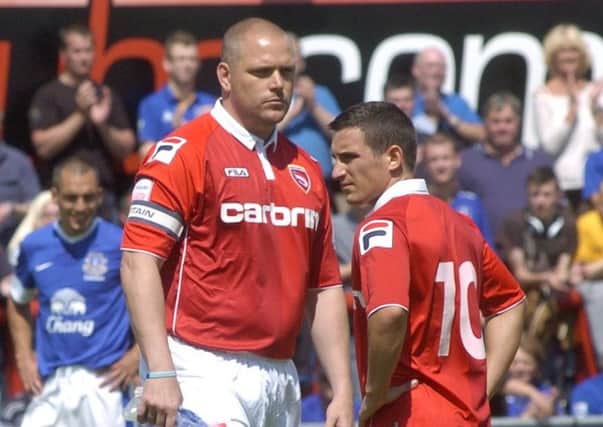 Jim Bentley kicks off his testimonial between Morecambe and Everton at the Globe Arena in 2012