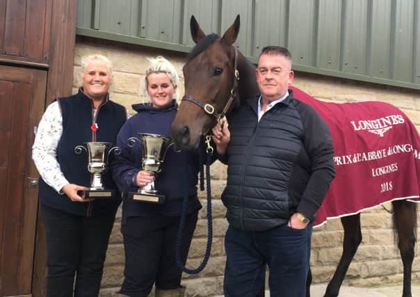 Emma Armstrong (left) and David Armstrong (right) with Mabs Cross at Highfield Farm in Chorley