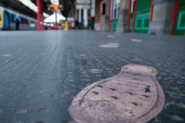 Bootprint on the the floor of Preston Train Station. Photo: Kelvin Stuttard