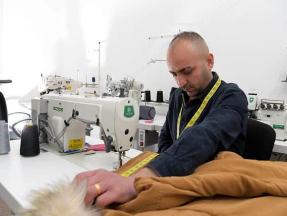 Jed Rached is a refugee from Syria who started a new tailors in Preston