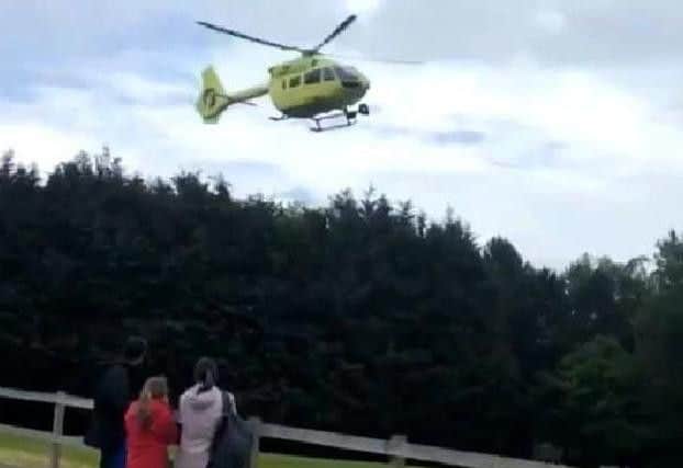 An air ambulance helicopter near Lightwater Valley