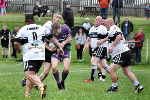 Chorley Panthers (playing in white) v Colostomy UK RL (playing in purple) rugby league